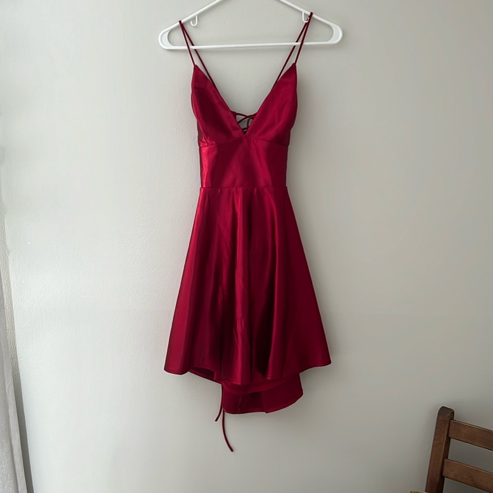 Never worn. Size L/10. Color: Burgundy
